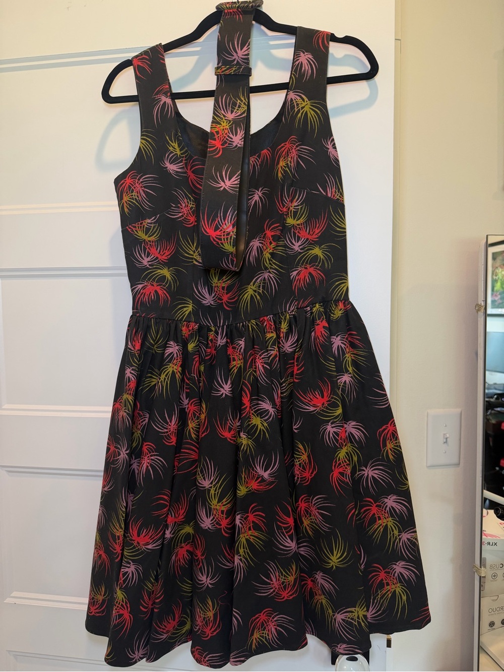 Pinup up girl clothing Laura Byrnes Black Firework Print Party Dress